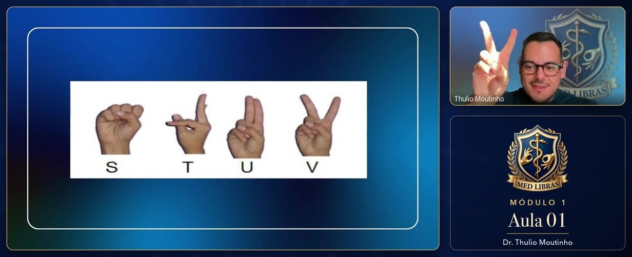 Aula 01 — alfabeto manual, letras S, T, U e V, com o professor sinalizando